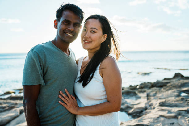 istock Multiethnic couple enjoying time together in nature 1993739726