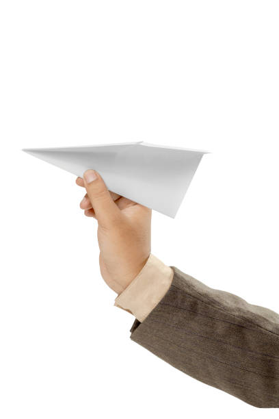 istock Business hand holding white paper plane origami 1993744927