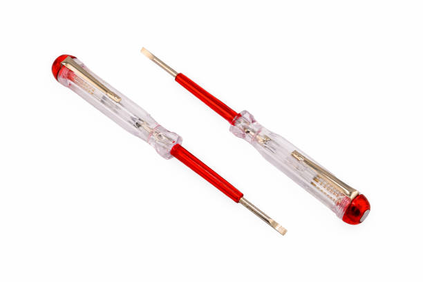 two indicator screwdrivers transparent, electrical tester isolated on white background close up top view