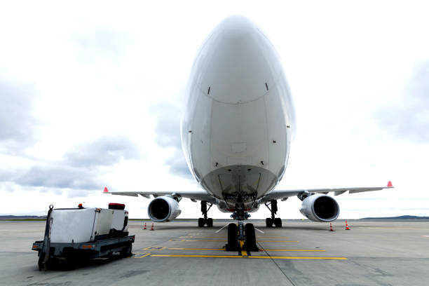 istock Passenger plane on taxiway at sunset 1993876983