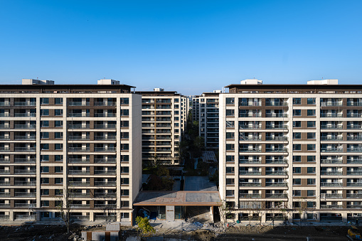 The sun shines on residential buildings on a sunny day