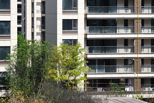 The sun shines on residential buildings on a sunny day