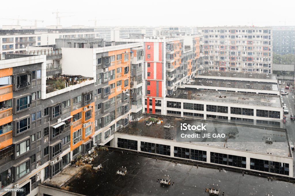 Modern residential building in snowy weather Agricultural Field Stock Photo Modern residential building in snowy weather Agricultural Field Stock Photo