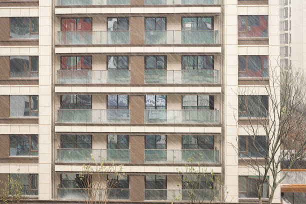 Modern residential building in snowy weather