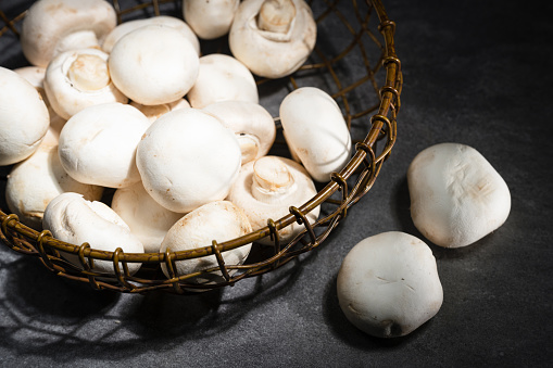 basket of white mushrooms