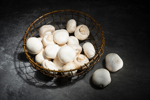 basket of white mushrooms