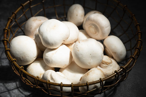 basket of white mushrooms