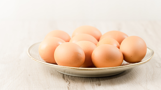 Bowl of boiled and peeled, ready to eat quail eggs