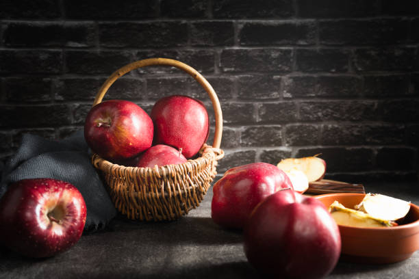 red apples on wooden background