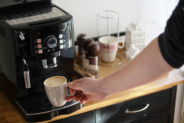 istock Preparing a cappuccino from a home espresso machine 1993953061