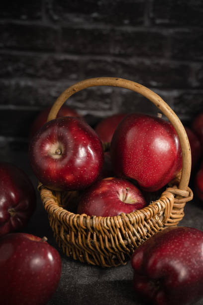 red apples on wooden background