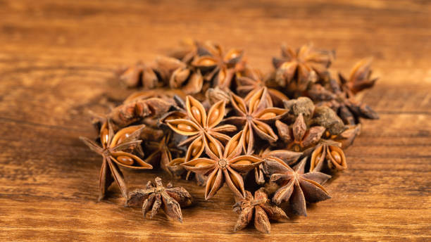 istock anise stars in a white bowl on wooden table 1993967098