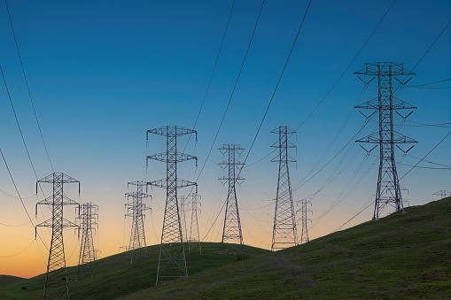 High Voltage Power Lines at the Crack of Dawn. Mission Peak Regional Preserve, Alameda County, California, USA.