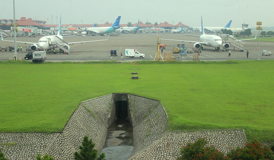 Jakarta, Indonesia - March 24, 2015 - Arrival and preparation for departure of aircraft at Soekarno-Hatta Airport, Jakarta.