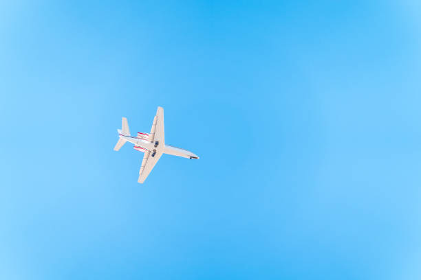 istock Airplane Cessna 680 before landing in blue sky. 1994146632
