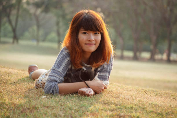 cute southeast asian woman in a park