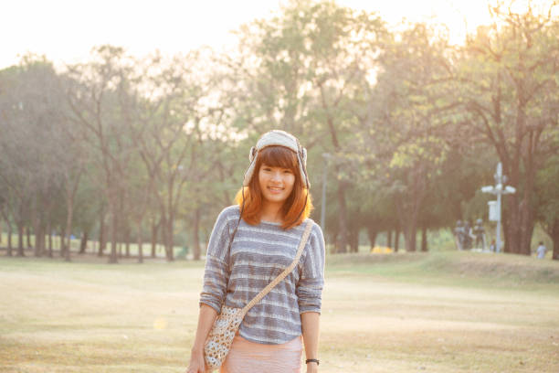 cute southeast asian woman in a park