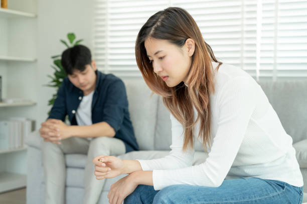 istock Divorce. Woman remove married ring. Couples desperate and disappointed after marriage. Husband wife sad, upset and frustrated after quarrels conflict. distrust, love problems, betrayals, family, lover 1994237980