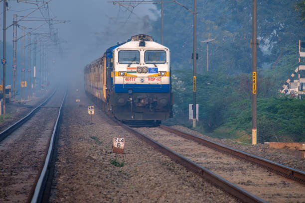 passenger trains india - diesel locomotive ストックフォトと画像