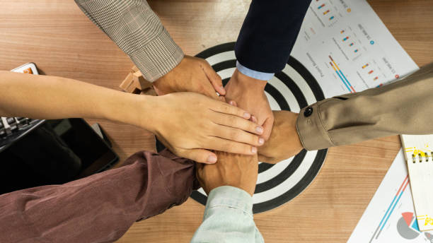 istock Businessman Point to a darts aiming at the target center business.Creative idea teamwork concept. Group of multiethnic diverse team, business partner, project meeting at modern office. 1994424535