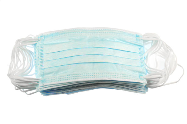 istock close up on stacking surgical mask isolated on white background 1994428223