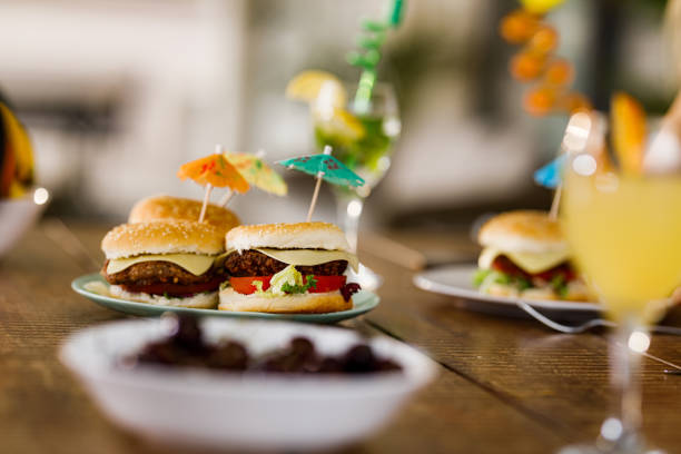 Close up of hamburgers on a plate at the table.