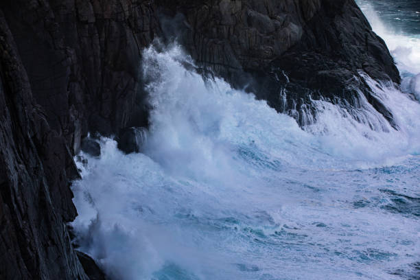 istock Rough dangerous ocean waves surging on cliff face during storm 1994457757