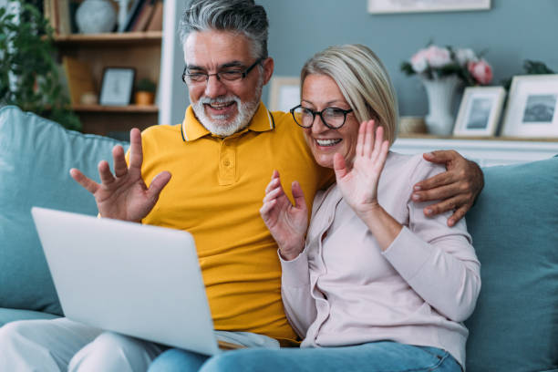 istock Couple making video call at home. 1994505192