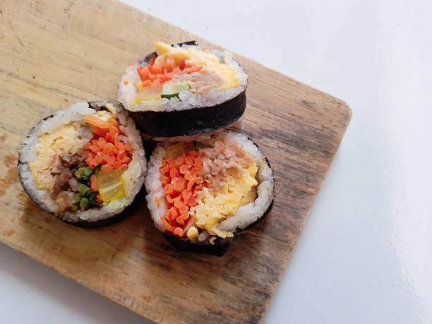 istock kimbap close-up. Korean style nori roll with yakiniku inside. 1994538872