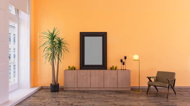 istock Frame mockup on a peach color color wall in a living room, 3d render design. 1994606350