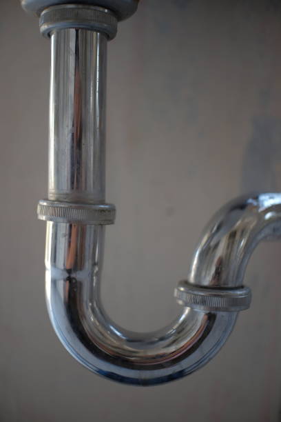 istock Sink pipe, made from stainless with a curved design 1994624742
