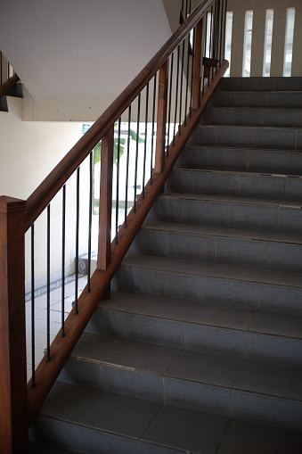 The stairs looked deserted, path leading to the next floor.