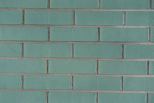 Backdrop - blue green brick wall with light grey mortar joints