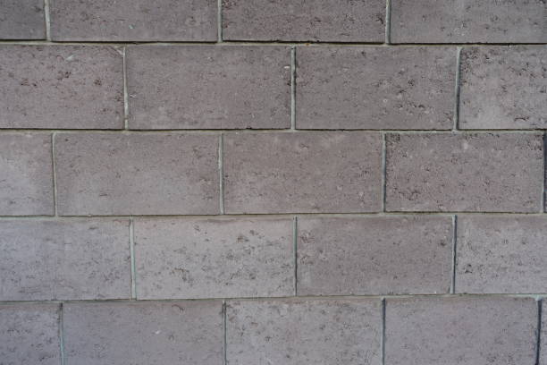 istock Rough surface of wall made of gray concrete masonry units 1994632092
