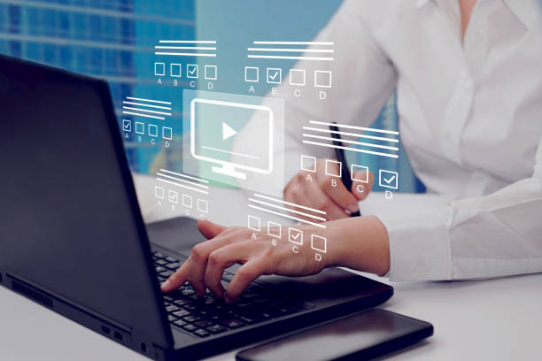 istock E-learning, education, online exam concept. Choose correct answer. Education internet online digital technology concept. 1994632100