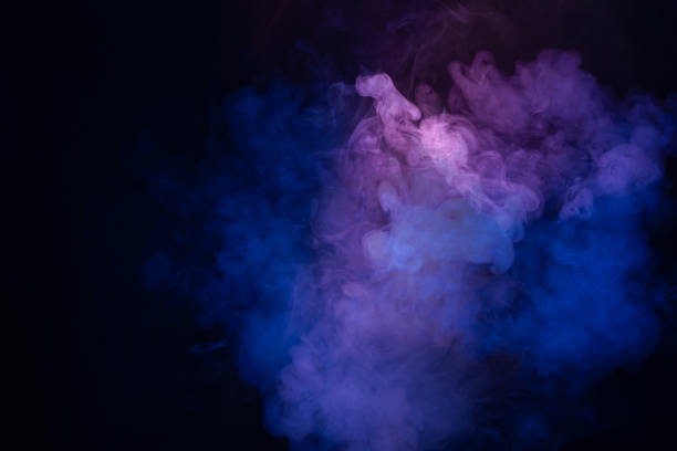 istock Blue and pink steam on a black background. 1994632632