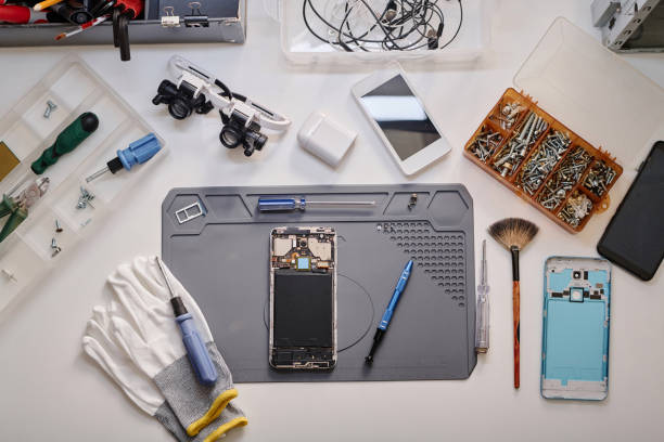 istock Disassembled Mobile Phone Prepared for Professional Diagnostic and Repairment 1994676195