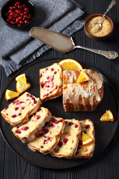 istock orange cranberry loaf with orange glaze, top view 1994724341