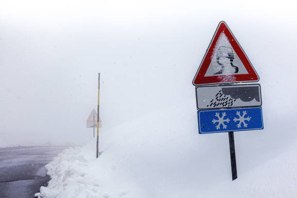 istock Severe winter road conditions during heavy snowfall 1994753843