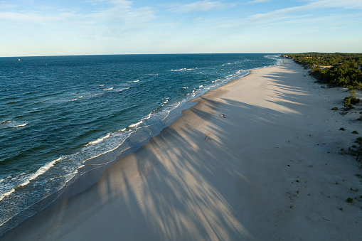 Beautiful wild beaches in HelWild beach in baltic sea. Aerial view of Hel Peninsula in Poland, Baltic Sea and Puck Bay .
