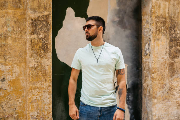 Handsome young man on the street in Valletta Malta.