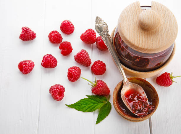 istock Raspberry jam with berry on light background. Homemade. Banner. 1994783105