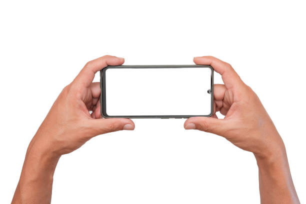 istock Men hand holding a blank smartphone display by two hands. game playing.take a photography. website searching online shopping and entertainment. 1994784195
