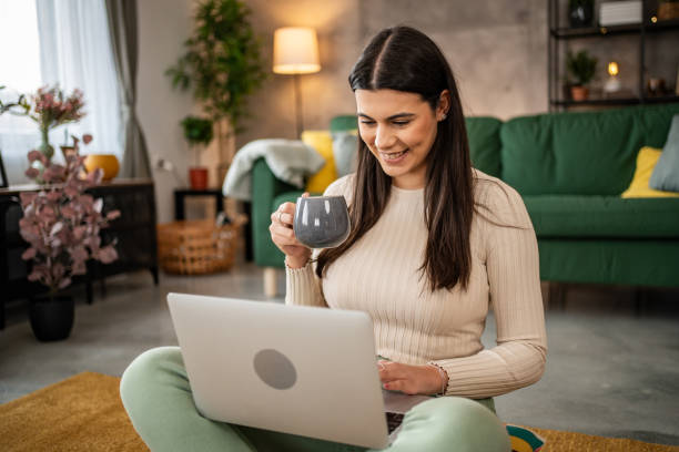 istock I completely relax with my laptop and internet browsing 1994790318