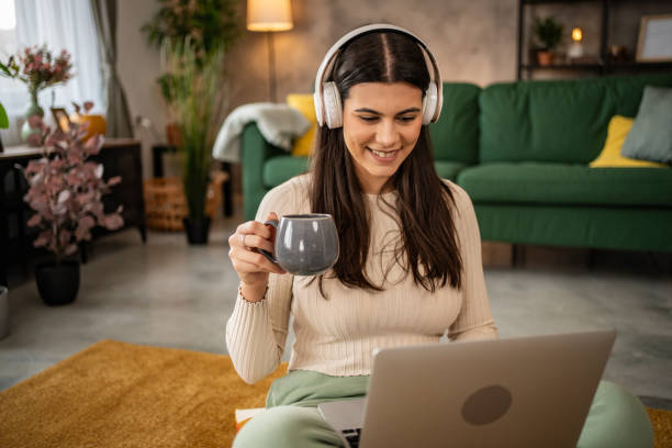 istock I completely relax with my laptop and internet browsing 1994791059