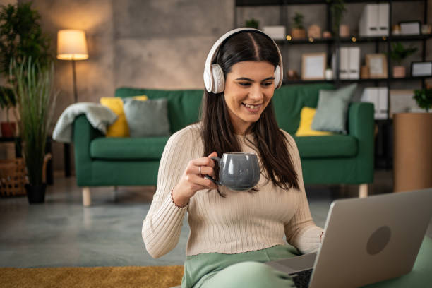 istock I completely relax with my laptop and internet browsing 1994791093