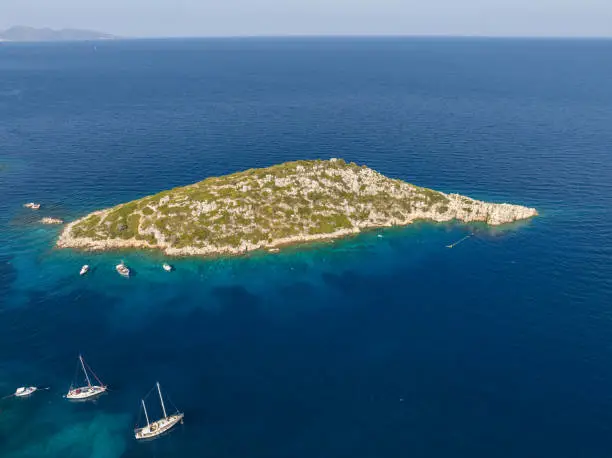 Photo of Aerial drone photo of Vardiola of Agios Nikolaos on island in Greece, Zakynthos. Agios Nikolaos - a small port on the island of Zante.