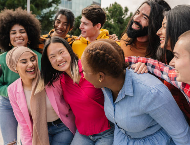istock multiethnic group celebrating friendship and equality together while taking a selfie 1994830658