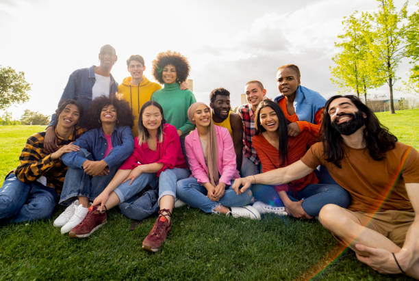 istock multicultural and diverse friends looking at camera for lasting friendship team photo 1994831185
