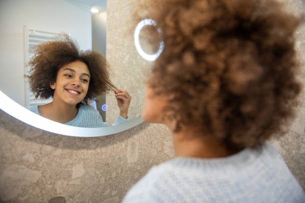 Morning routine of a young girl stock photo